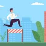 Three people in business attire overcome hurdles—a man jumps obstacles, another runs, and a woman climbs a wall—symbolizing ai adoption challenges as they strive toward a gold trophy against a cityscape backdrop.