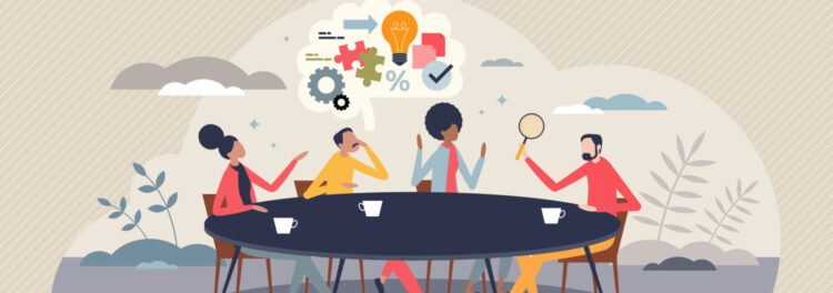 Illustration of four people sitting around a table discussing ideas, with a thought bubble of gears, lightbulb, charts, and icons above them—depicting how to build a culture of innovation through collaborative brainstorming.