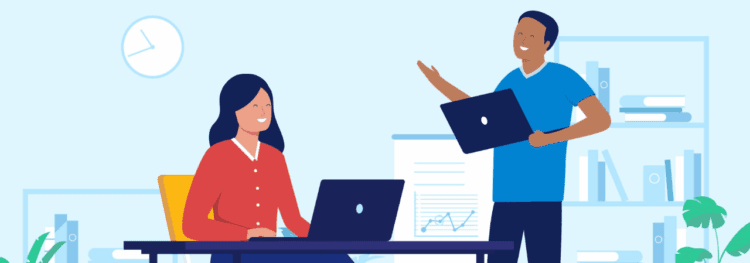 Two people in an office setting; one sits at a desk working on a laptop, while the other stands holding a laptop and discussing Hyland Insight, with charts and shelves in the background.