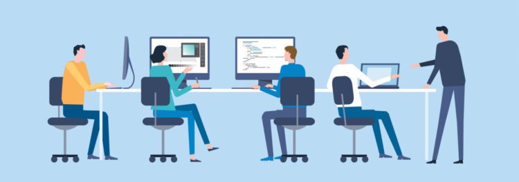 Illustration of four people seated at desks working on computers, while a fifth person stands nearby pointing at a laptop screen—depicting collaboration in managed services and digital transformation.