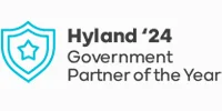 Logo with a blue outlined shield and star, and text reading "Hyland '24 Government Partner of the Year" in black letters on a white background.