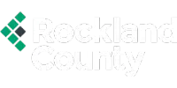 Rockland County logo with two green diamond shapes to the left of the white text "Rockland County" on a black background.