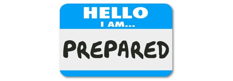 A blue and white name tag sticker reads “HELLO I AM… PREPARED” in bold black letters, signaling readiness for the upcoming OnBase Upgrade.