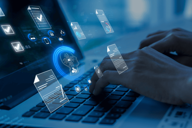Hands typing on a laptop keyboard with digital document and cloud icons overlaid, representing data management and online file processing—an essential foundation for building an enterprise knowledge layer for insurance.